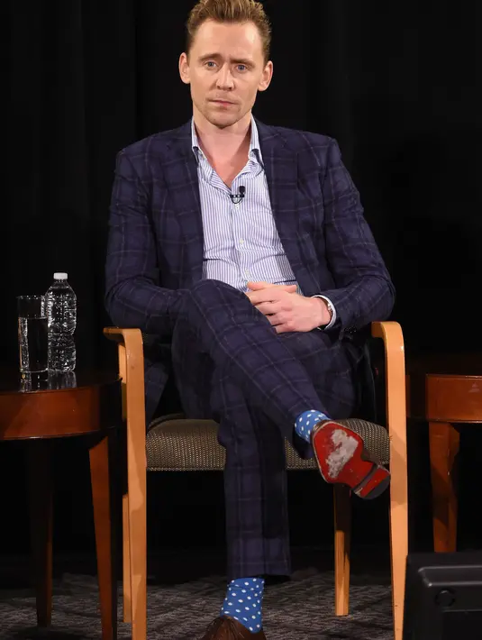 'Kau sangat tampan Tom. Mengapa kau bukan mengunggah foto bersama Taylor. Seharusnya kau membuat momen perdana bersama Taylor di instagram mu bukan," komentar netizen. (AFP/Bintang.com)