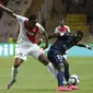 Monaco's Anthony Martial (L) challenges Paris St Germain's Serge Aurier during their Ligue 1 soccer match at Louis II stadium in Monaco August 30, 2015. REUTERS/Eric Gaillard