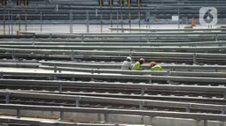 Sejumlah pekerja menyelesaikan proyek pembangunan depo LRT (Light Rail  Transit ) di Jatimulya, Bekasi Jawa Barat, Sabtu (11/6/2022). Saat ini pembangunan depo LRT (Light Rail  Transit ) konstruksinya telah mencapai  90 persen. (merdeka.com/Imam Buhori)