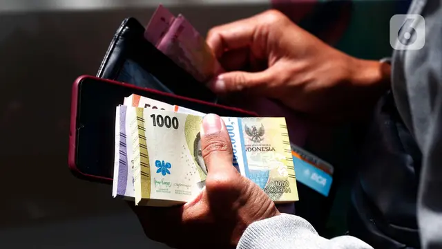 Warga Mulai Berburu Penukaran Uang Baru Lebaran