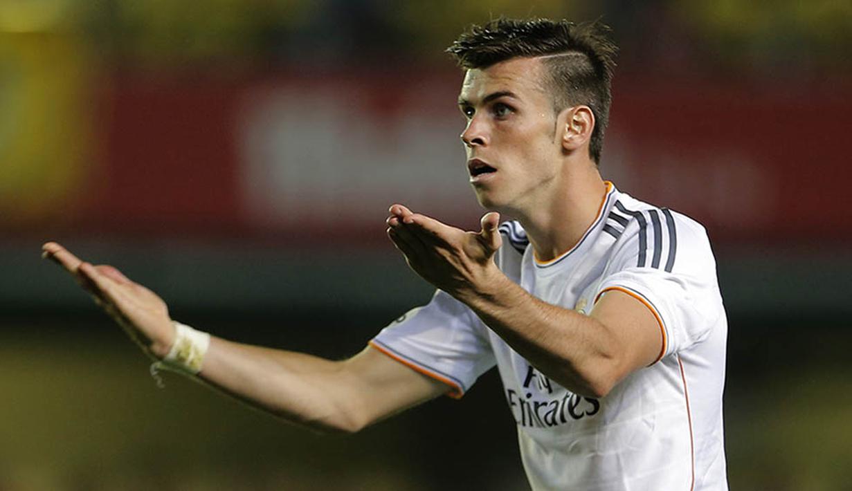 9. Jika di Real Madrid tokoh utamanya adalah Cristiano Ronaldo maka jika gabung Setan Merah, Gareth Bale akan menjadi bintang utama dari Manchester United. Sinar kebintangannya kan semakin bercahaya. (AFP/Jose Jordan)