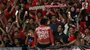 Salah satu suporter tim Garuda mencat tubuhnya saat menyaksikan laga Timnas Indonesia melawan Timor Leste pada penyisihan grup B Piala AFF 2018 di Stadion GBK, Jakarta, Selasa (13/11). Indonesia unggul 3-1. (Liputan6.com/Helmi Fithriansyah)