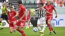 Gol tersebut tercipta setelah memaksimalkan umpan Dejan Kulusevski dengan tembakan kaki kanan dari tengah kotak penalti. (AFP/Alberto Pizzoli)
