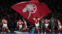 Gelandang Arsenal, Mikel Merino (tengah kanan) merayakan gol ketiga tim saat pertandingan leg pertama perempat final Liga Champions 2024/2025 melawan Real Madrid, di Stadion Emirates, London, pada 8 April 2025 atau Rabu 9 April 2025 dini hari WIB. (Adrian Dennis/AFP)