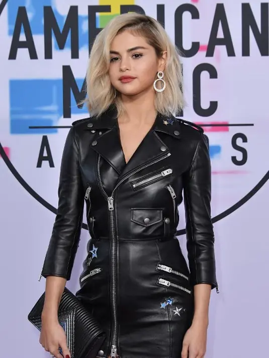 “Kini aku sudah lebih sehat. Aku tak tahu jika temanku itu tidak datang dan membantu. Mungkin kondisiku akan semakin parah. Sejak itu, aku pun memberi tahu yang lain, ‘kamu tak sendirian’. Aku sangat bersyukur,” tambahnya. (AFP/Neilson Barnard)