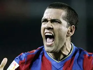 Kegembiraan bek Barcelona, Daniel Alves seusai gol Lionel Messi ke gawang Malaga dalam lanjutan La Liga di Camp Nou Stadium, 27 Februari 2010 AFP PHOTO / JOSEP LAGO 
