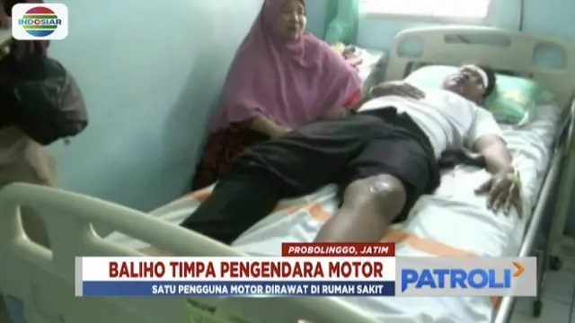 Seorang pengendara motor terluka parah usai tertimpa baliho caleg Probolinggo yang robek.