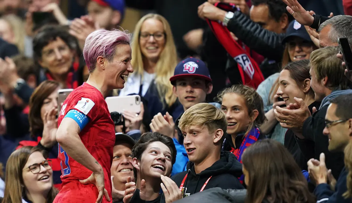 Jumlah gol dari Megan Rapinoe sama dengan kompatriotnya Alex Morgan namun unggul karena menit bermain yang lebih sedikit. (Photo by Lionel BONAVENTURE / AFP)