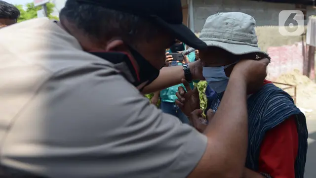 FOTO: Pandemi COVID-19, TNI - Polri Imbau Warga Patuhi Protokol Kesehatan
