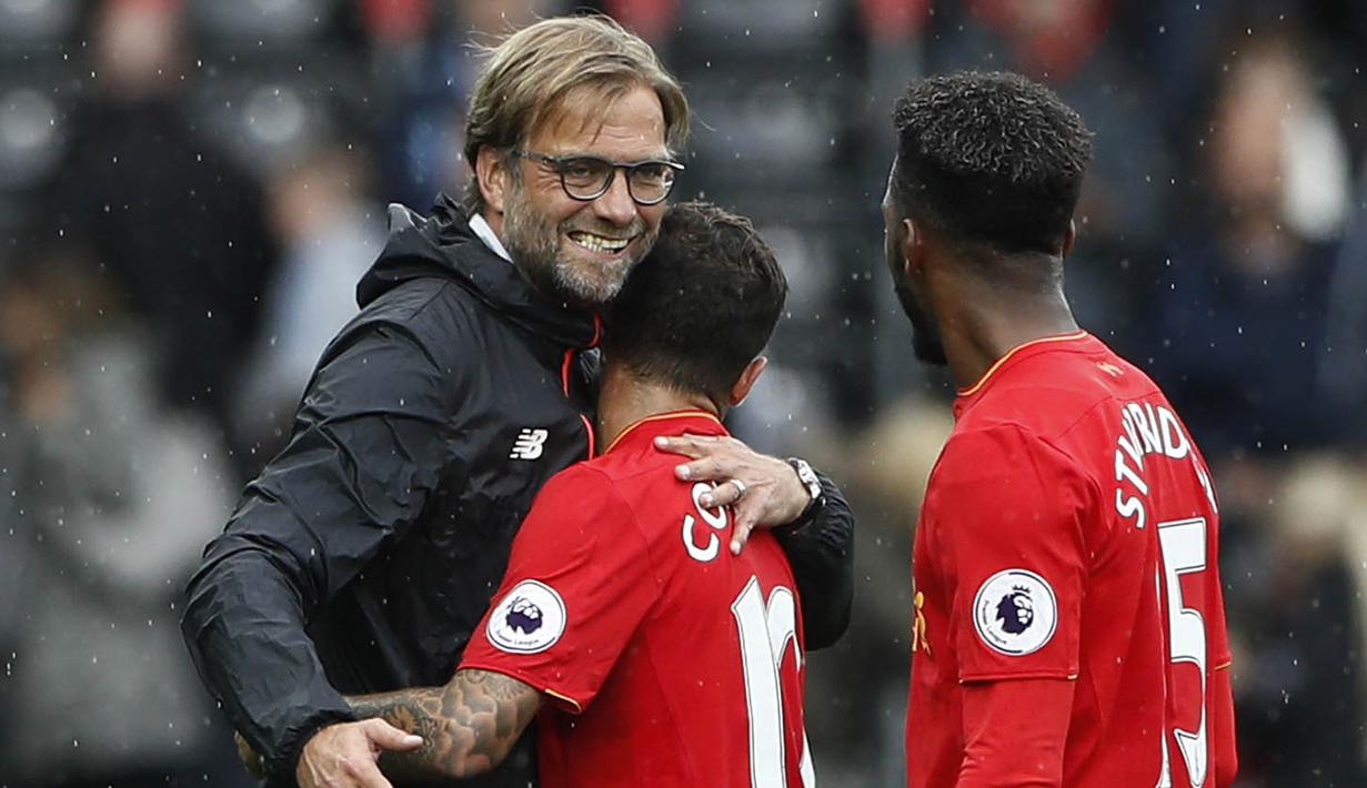 Liverpool kembali menunjukan trend positif dengan membungkam tuan rumah Swansea 2-1. Kemenangan ini mengantar The Reds duduk di posisi keempat klasemen Liga Inggris. (Reuters/Stefan Wermuth)