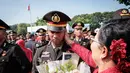 Suasana haru dan bangga mewarnai Istana Kepresidenan usai upacara Prasetya Perwira (Praspa) TNI dan Polri. (YASUYOSHI CHIBA/AFP)