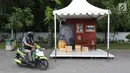 Sebuah booth photo terpasang di sekitar komplek Stadion Manahan, Solo, Selasa (7/11). Lokasi tersebut telah disiapkan panitia sebagai salah satu kantong parkir kendaraan tamu acara pernikahan Kahiyang Ayu dan Bobby Nasution. (Liputan6.com/Angga Yuniar)