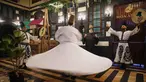 Para penari berputar menampilkan tarian Sufi di sebuah restoran selama pertunjukan yang diadakan setelah berbuka puasa selama bulan suci Ramadan 1447 Hijriah, di distrik bersejarah Damaskus, Suriah, Minggu 22 Februari 2026. (AP Photo/Ghaith Alsayed)