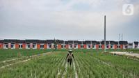 Aktivitas warga di perumahan subsidi Griya Srimahi Indah, Tambun Utara, Kabupaten Bekasi, Jawa Barat, Rabu (16/2/2022). PT Bank Tabungan Negara (Persero) Tbk berhasil menyalurkan KPR FLPP mencapai 13.192 unit sampai akhir Januari 2022. (merdeka.com/Iqbal S. Nugroho)