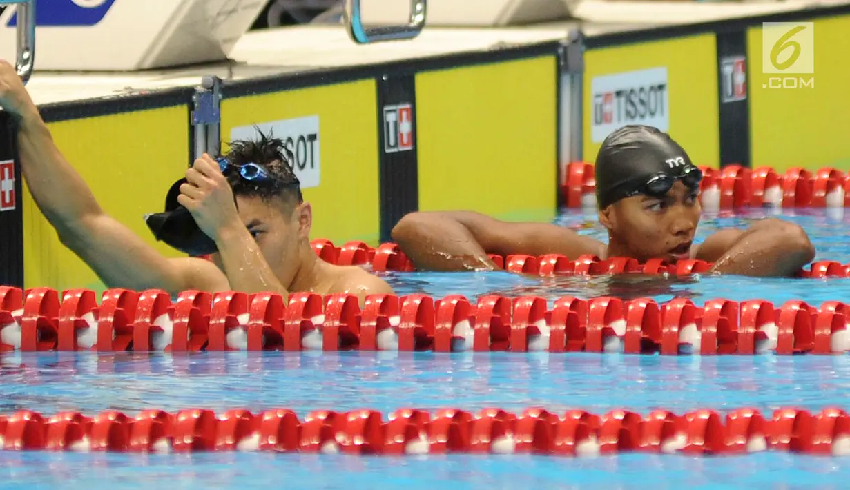 Perenang Indonesia,Triady Fauzi Sidiq usai pertandingan 200 meter gaya ganti perorangan putra.Asian Games 2018 di Stadion Akuatik GBK, Jakarta, Senin (20/8).  (merdeka.com/Arie Basuki)