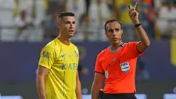 Al Nassr sempat mendapatkan hadiah penalti di menit ke-45+10, tapi wasit menganulirnya. Skor tidak berubah hingga turun minum. (AFP/Fayez Nureldine)