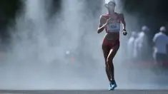 Atlet Tiongkok,  Lu Xiuzhi, saat berlomba di final nomor jalan cepat 20km putri Kejuaraan Dunia Atletik 2015 di Stadion Nasional, Beijing, Tiongkok. (28/8/2015). (AFP Photo/Wang Zhao)