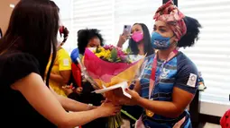 Neisi Patricia Dajomes Barrera sukses meraih medali emas usai berhasil menjadi yang terbaik pada pertandingan angkat besi 76kg putri di Olimpiade Tokyo 2020. (Foto: AFP/Ecuador's Ministry of Sports)