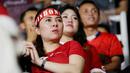 Suporter tampak serius menyaksikan laga Timnas Indonesia vs Argentina pada FIFA Matchday 2023 di Stadion Utama Gelora Bung Karno, Jakarta, Senin (19/6/2023). (Bola.com/Muhammad Iqbal Ichsan)
