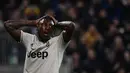 Ekspresi penyerang Juventus Moise Kean saat bertanding melawan Cagliari dalam lanjutan Liga Italia di Sardegna Arena, Cagliari, Italia, Selasa (2/4). Juventus menang dengan skor 2-0. (Marco BERTORELLO/AFP)