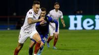 Dynamo Zagreb harus tersingkir dari Europa League 2021/2022 meski menang 1-0 melawan Sevilla di leg kedua babak playoff 16 besar. Dinamo kalah agregat 2-3 dari Sevilla (AFP/Denis Lovrovic)