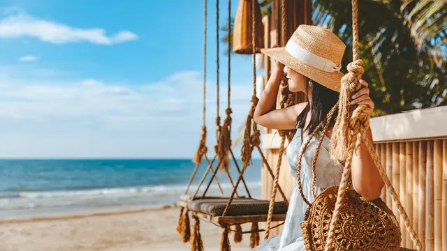 Ilustrasi traveling ke pantai