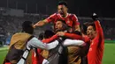 Pemain Benfica merayakan keberhasilan menaklukan Zenit 2-1 pada leg kedua babak 16 besar Liga Champions di Stadion Petrovsky, Rusia, Kamis (10/3/2016) dini hari WIB. Benfica lolos ke perempat final berkat unggul agregat 3-1. (AFP/Olga Maltseva)