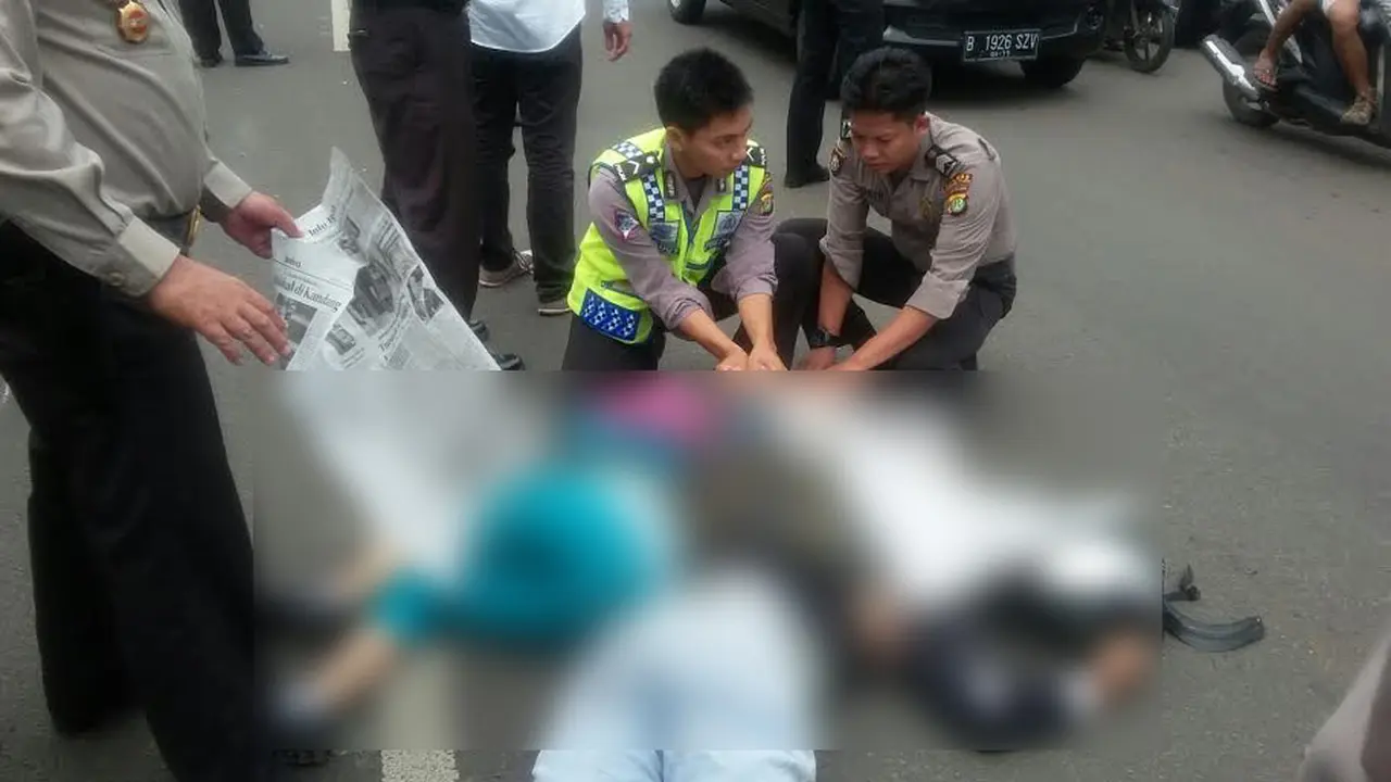 20160118-Sejoli Tewas-Berpelukan-Usai Terlindas-Truk-Bintaro-Tangerang Selatan