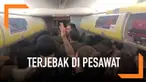 Sebanyak 200 penumpang terjebak di pesawat karena cuaca buruk selama 6 jam. Mereka protes pada kru kabin karena tak diberi makan dan minum.