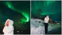 Bikin takjub, melihat aurora secara langsung adalah impian tak sedikit orang. Diketahui tempat terbaik menemukan aurora biasanya dari perbatasan utara dengan Norwegia ke Jokkmokk. Dalam keterangan unggahannya, Medina Dina menuliskan jika ia sudah berharap untuk melihat aurora tahun 2018 ketika ke Islandia, namun sayang kala itu ia belum beruntung. (Liputan6.com/IG/@gadiiing/@medinadinaaa)