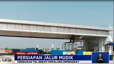Para pekerja kini terus melakukan pekerjaan pembuatan rambu dan lampu-lampu penerangan.