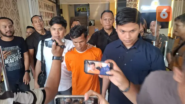Tersangka Hengki pembunuh istrinya sendiri di Bandar Lampung. Foto : (Liputan6.com/Ardi).