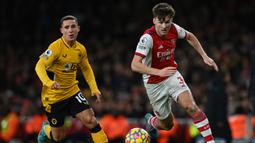 Kieran Tierney. Bek kiri Inggris berusia berusia 25 tahun yang sejak awal musim 2019/2020 menjadi milik Arsenal usai didatangkan dari Glasgow Celtic ini kini tercatat memiliki nilai pasar senilai 32 juta euro atau setara Rp493 miliar. Nilai pasarnya saat ini merupakan yang tertinggi sepanjang kariernya yang stabil ia pertahankannya sejak 13 Oktober 2020. Musim ini ia telah tampil dalam 14 laga di semua ajang dengan torehan 1 assist. (AFP/Glyn Kirk)