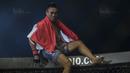 Petarung Indonesia, Sunoto, merayakan kemenangan atas petarung Kamboja, Rin Saroth, pada laga One Championship di JCC Senayan, Jakarta, Sabtu (20/1/2018). Sunoto berhasil mengalahkan Saroth. (Bola.com/Vitalis Yogi Trisna)