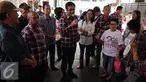 Cawagub, Djarot Saiful Hidayat memaparkan program kerjanya saat kegiatan pengobatan gratis di Pengadegan Barat, Jakarta, Kamis (26/1). Pengobatan gratis tersebut dilakukan untuk memberikan penyuluhan mengenai hidup sehat. (Liputan6.com/Gempur M. Surya)