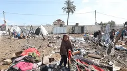 Serangan tersebut menghantam kamp pengungsi Palestina di Deir al-Balah. (Eyad BABA/AFP)