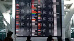 Pihak berwenang menginformasikan bahwa puluhan penerbangan ke dan dari pulau Bali dibatalkan pada 18 Juni 2025. (SONNY TUMBELAKA/AFP)