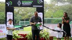 Ketua Umum KONI, Marciano Norman melakukan potong pita saat Launching Borussia Academy di Deutsche Schule Jakarta, BSD, Tangerang, Sabtu (03/06/2023). (Bola.com/Bagaskara Lazuardi)