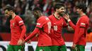 Unggul 3-1, Portugal berhasil meraih poin penuh sekaligus mengokohkan posisi mereka di puncak klasemen grup 1 UEFA Nations League A dengan raihan sembilan poin. (Sergei GAPON/AFP)