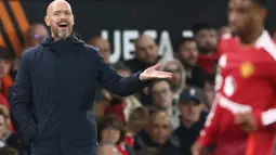 Menjamu FC Twente, Manchester United harus puas berbagi poin usai bermain imbang dengan skor 1-1. (Darren Staples/AFP)
