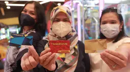 Setelah 18 bulan tutup, Timezone Indonesia kembali beroperasi dengan meluncurkan Timezone Rewards kepada pengunjung berdasarkan loyalitas dengan tingkatan; Welcome card, Blue Elite, dan Gold. (Liputan6.com/HO/Ading)