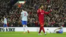 Pemain Liverpool Mohamed Salah melakukan selebrasi usai mencetak gol gawang Manchester United pada pertandingan sepak bola Liga Inggris di Stadion Anfield, Liverpool, Inggris, 19 April 2022. Liverpool menang 4-0. (AP Photo/Jon Super)