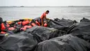 Diduga kapal itu tersebut terbalik dan tenggelam ketika hujan deras yang dipicu Topan Gaemi melanda wilayah Manila dan sekitarnya dalam beberapa hari terakhir. (Jam Sta Rosa/AFP)