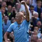 Striker Manchester City, Erling Haaland merayakan gol yang ia cetak ke gawang Ipswich Town dalam laga Premier League, Sabtu (24/8/2024). (AFP/Darren Staples)