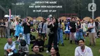 Pengunjung menikmati salah satu penampilan di Joyland Festival Jakarta 2023 di GBK Baseball Stadium, Jakarta, Jumat (24/11/2023). (Liputan6.com/Herman Zakharia)
