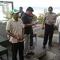 Karyawan hotel itu tiba-tiba berteriak dan langsung tak sadarkan diri di kolam renang. (Liputan6.com/Ola Keda)