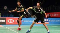Ganda campuran, Tontowi Ahmad/Liliyana Natsir, takluk dari pasangan Inggris, Chris Adcock/Gabrielle Adcok, pada perempat final Malaysia Terbuka 2018, Jumat (29/6/2018). (PBSI)