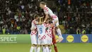 Para pemain Kroasia merayakan gol yang dicetak oleh Andrej Kramaric ke gawang Armenia pada laga Kualifikasi Euro 2024 di Stadion Vazgen Sargsyan Republican, Armenia, Senin (11/9/2023). Kroasia menang dengan skor 1-0. (AFP/Karen Minasyan)