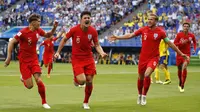 Bek Inggris, Harry Maguire, merayakan gol yang dicetaknya ke gawang Swedia pada laga perempat final Piala Dunia di Samara Arena, Samara, Sabtu (7/7/2018). Inggris menang 2-0 atas Swedia. (AP/Francisco Seco)