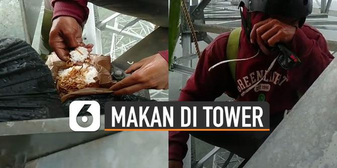 VIDEO: Penuh Perjuangan, Pria Makan di Atas Tower Saat Hujan Deras